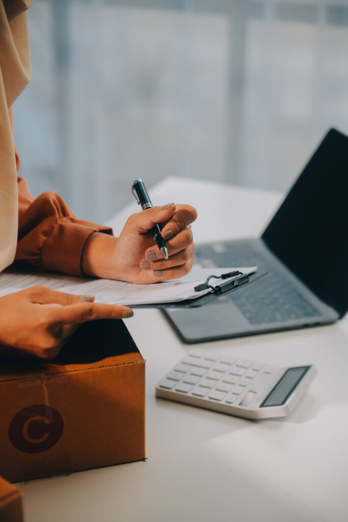 Starting small businesses SME owners female entrepreneurs Write the address on receipt box and check online orders to prepare to pack the boxes, sell to customers, sme business ideas online.